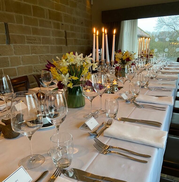 Dinner table setting at West Acre Lodge